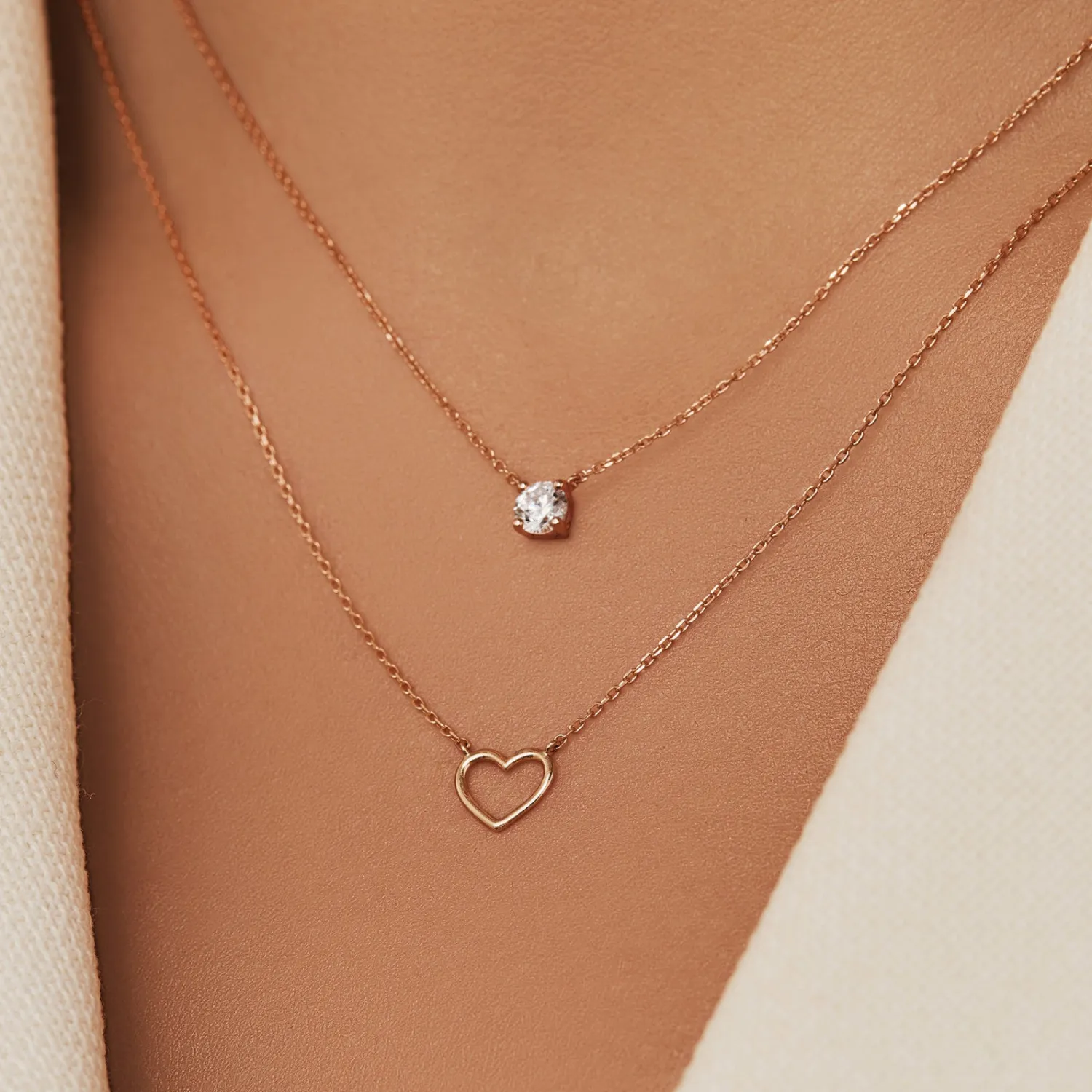 Shop Cadeau d'Isabel 14 karaat rosé gouden collier en armband giftset met hartje Rosé Gouden Colliers | Rosé Gouden Armbanden