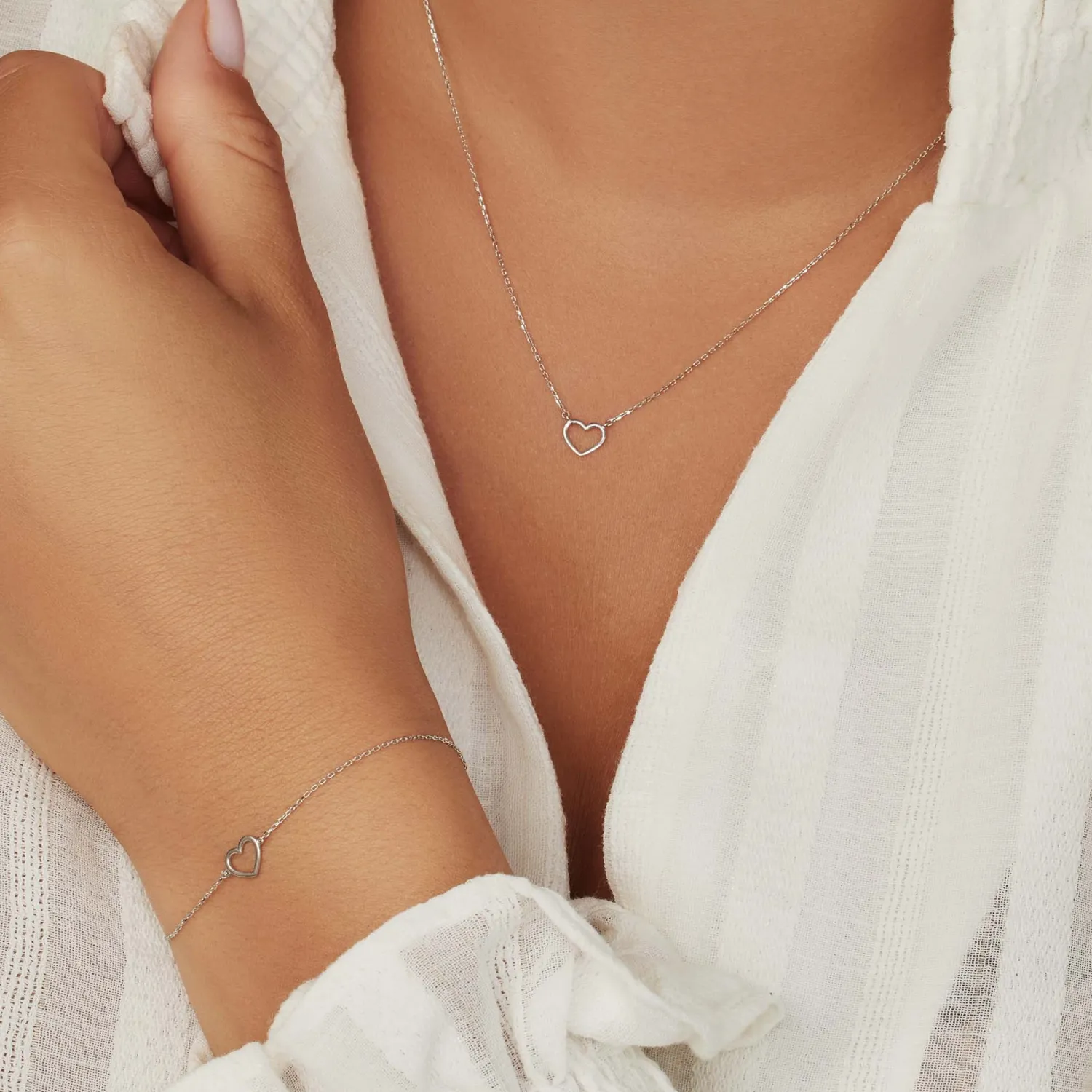 Clearance Cadeau d'Isabel 14 karaat witgouden collier en armband giftset met hartje Hartjes Colliers | Hartjes Armbanden
